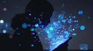 A person's silhouette illuminated by digital patterns from a tablet screen, with floating emotional data visualizations in blue and purple, representing AI journaling technology in a reflective atmosphere.